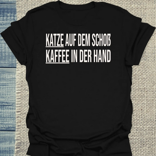 T-Shirt - Katze auf dem Schoß. Kaffee in der Hand. - Unisex - Katze & Kaffee Schwarz